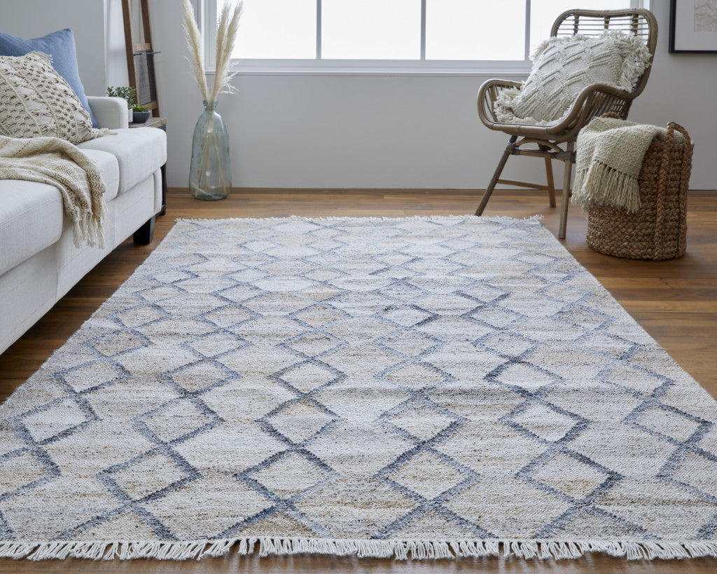 5' X 8' Gray Ivory And Tan Geometric Hand Woven Stain Resistant Area Rug With Fringe