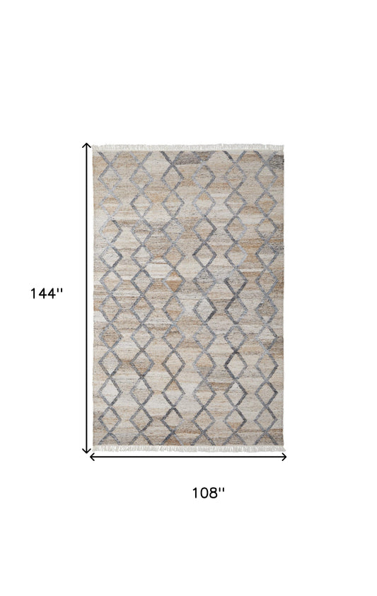 4' X 6' Gray Ivory And Tan Geometric Hand Woven Stain Resistant Area Rug With Fringe