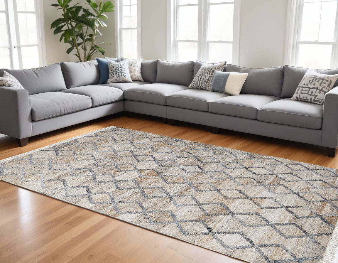 5' X 8' Gray Ivory And Tan Geometric Hand Woven Stain Resistant Area Rug With Fringe