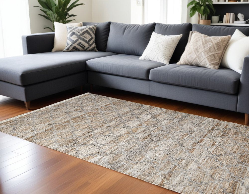 10' X 13' Tan Gray And Ivory Geometric Hand Woven Stain Resistant Area Rug With Fringe