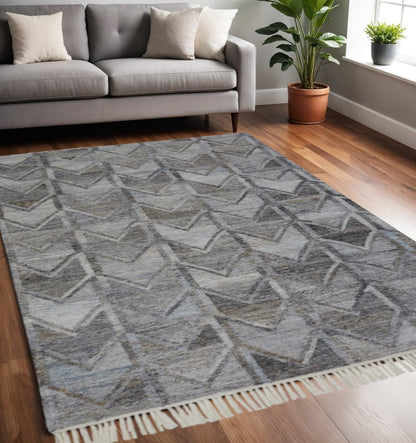 5' X 8' Gray And Black Geometric Hand Woven Area Rug With Fringe