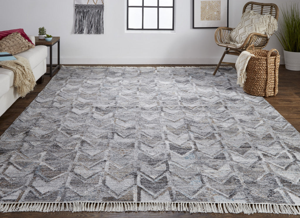 5' X 8' Gray Silver And Taupe Geometric Hand Woven Stain Resistant Area Rug With Fringe