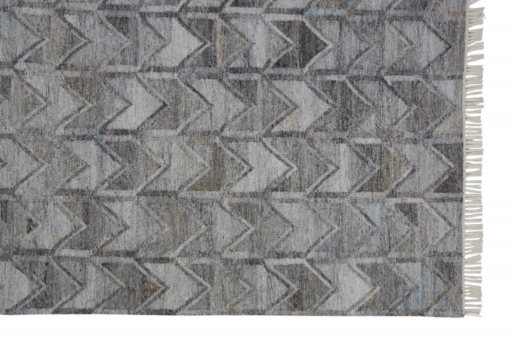 5' X 8' Gray Silver And Taupe Geometric Hand Woven Stain Resistant Area Rug With Fringe