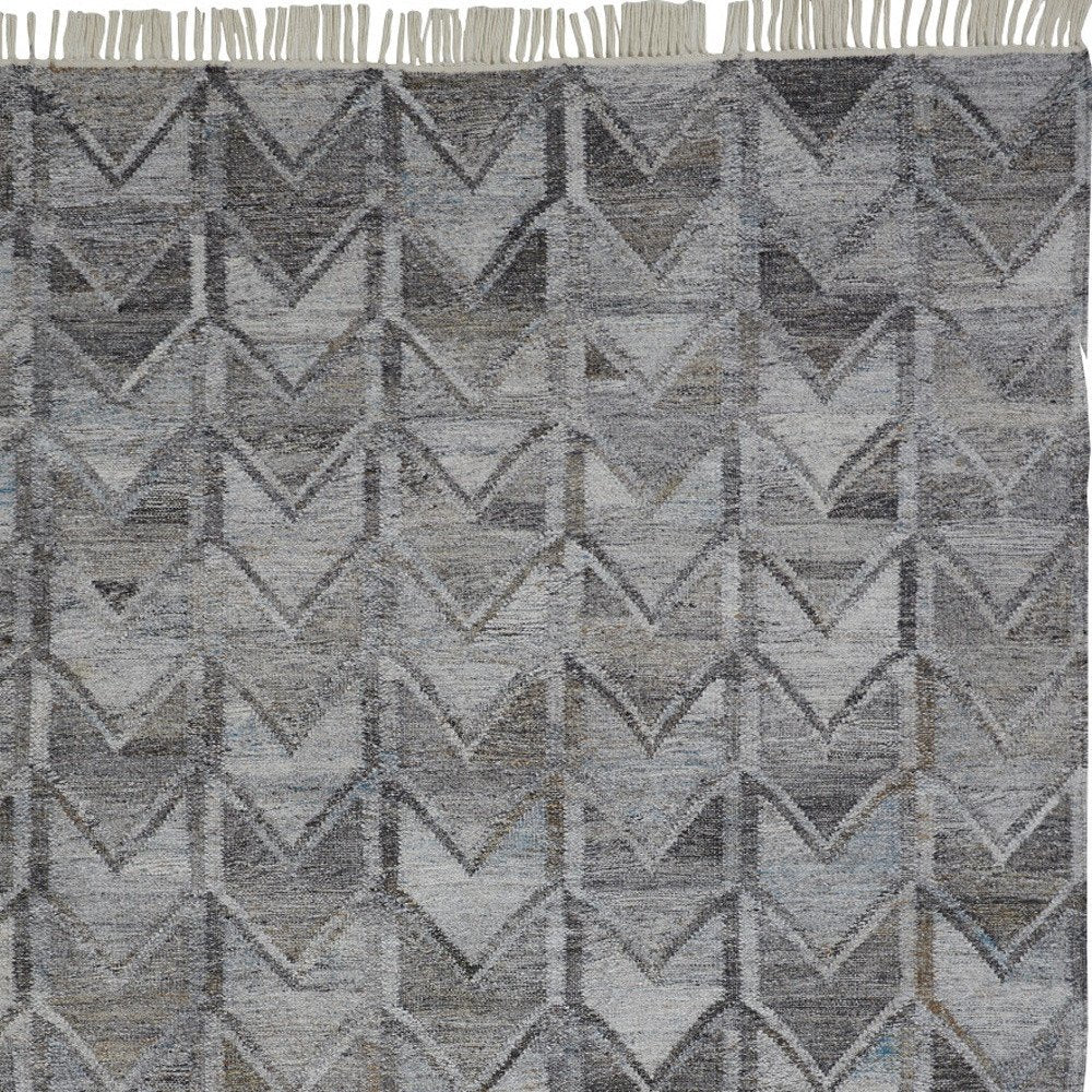 5' X 8' Gray And Black Geometric Hand Woven Area Rug With Fringe