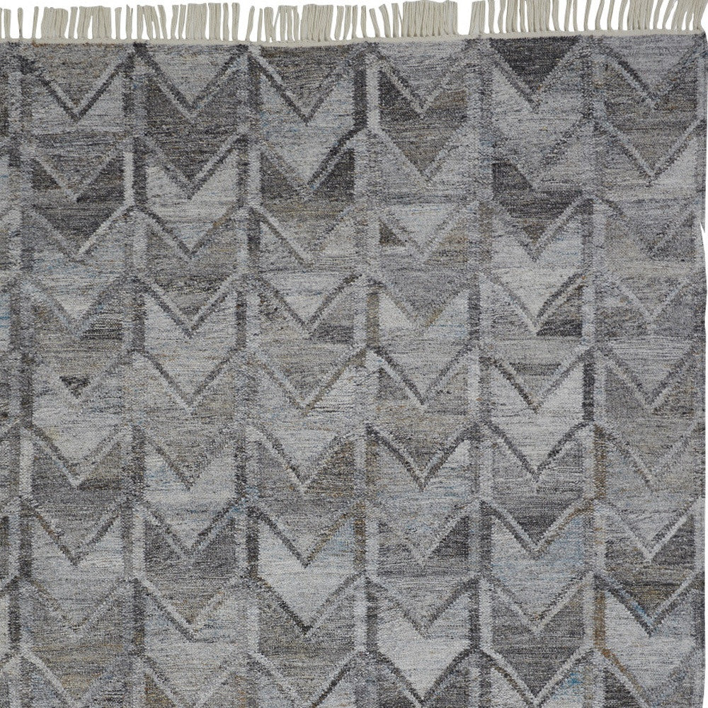 2' X 3' Gray Silver And Taupe Geometric Hand Woven Stain Resistant Area Rug With Fringe