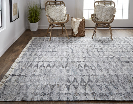 4' X 6' Gray Silver And Ivory Geometric Hand Woven Stain Resistant Area Rug With Fringe