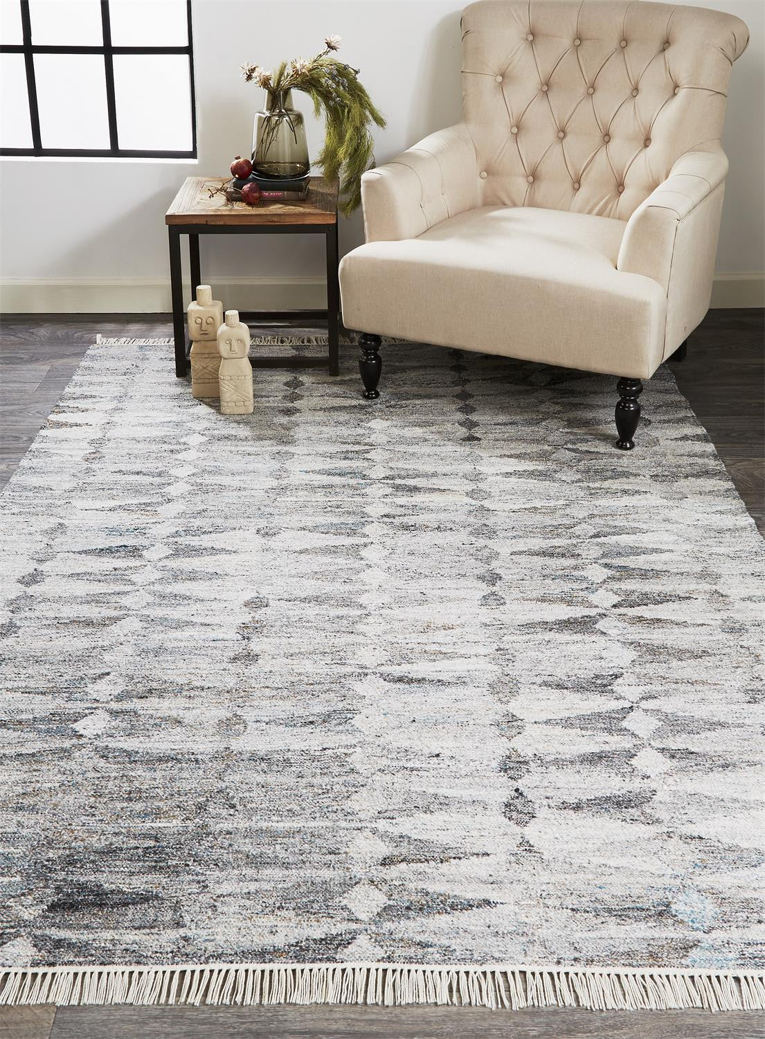 4' X 6' Gray Silver And Ivory Geometric Hand Woven Stain Resistant Area Rug With Fringe