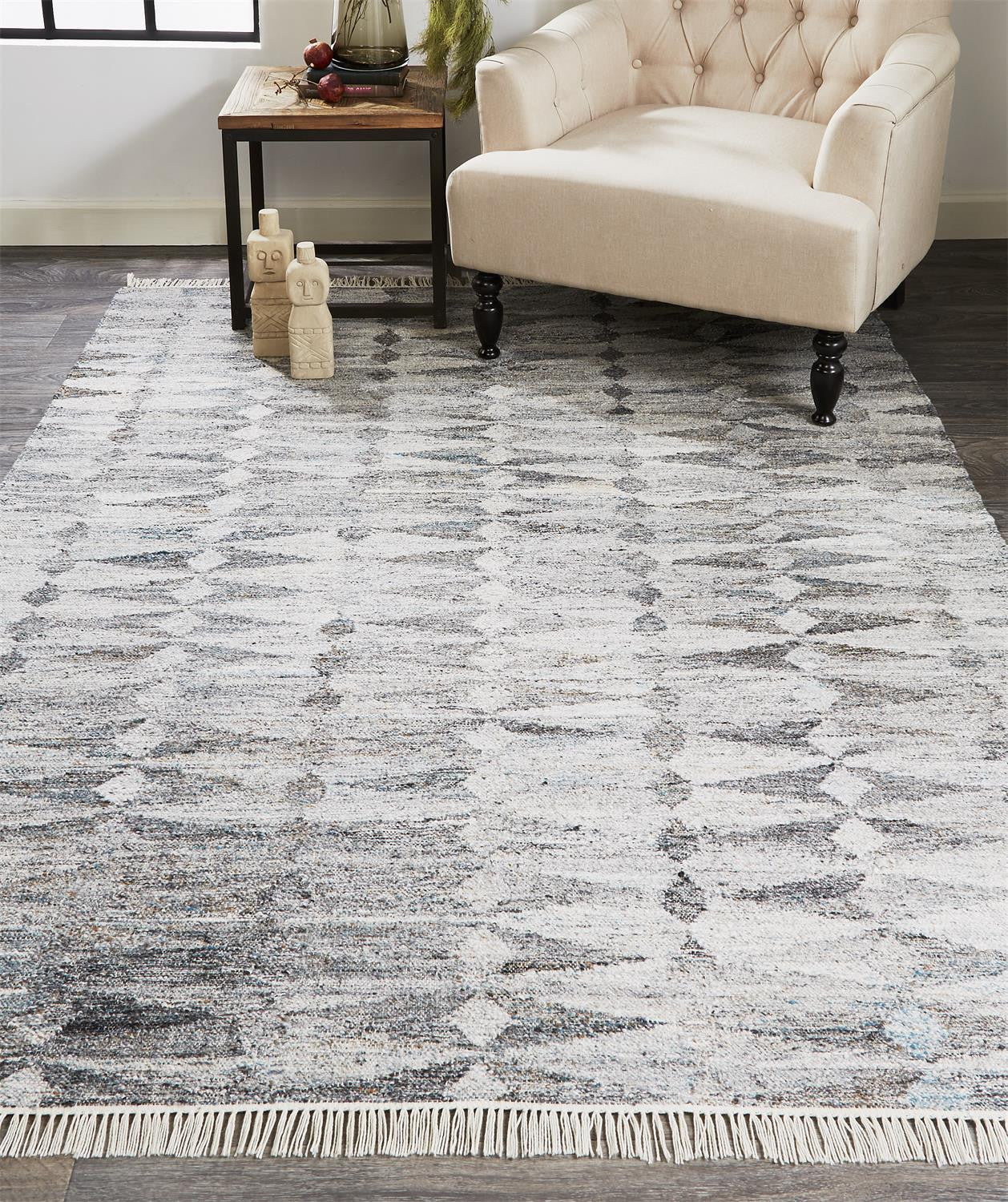 4' X 6' Gray Silver And Ivory Geometric Hand Woven Stain Resistant Area Rug With Fringe