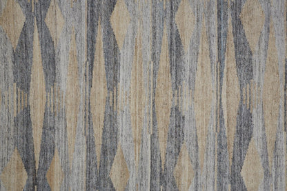 5' X 8' Gray Black And Brown Abstract Hand Woven Area Rug With Fringe