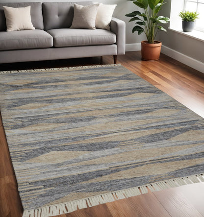 5' X 8' Gray Black And Brown Abstract Hand Woven Area Rug With Fringe