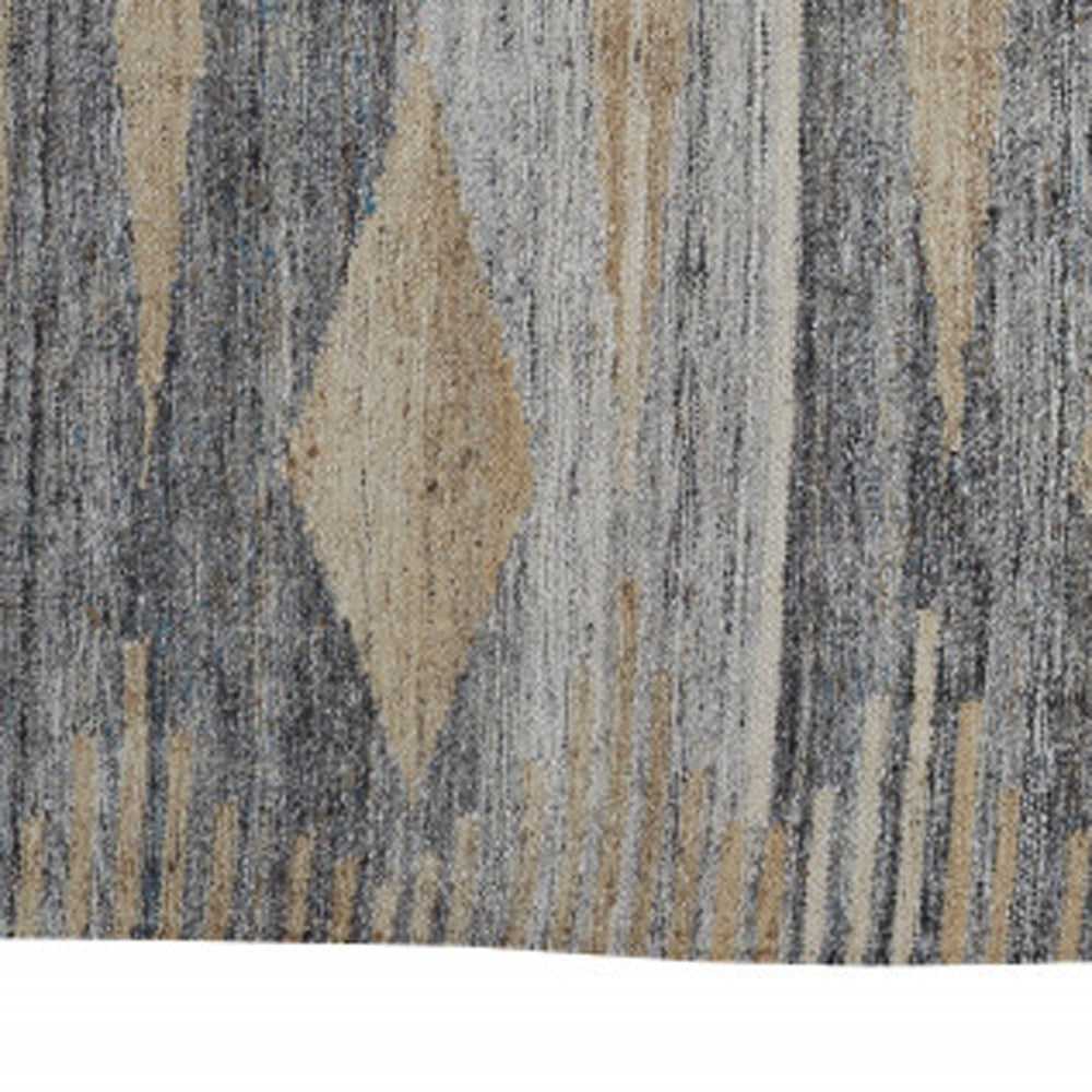 5' X 8' Gray Tan And Silver Abstract Hand Woven Stain Resistant Area Rug With Fringe