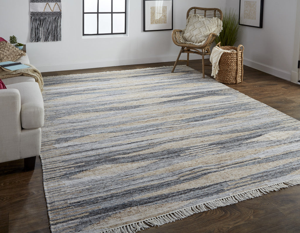 5' X 8' Gray Tan And Silver Abstract Hand Woven Stain Resistant Area Rug With Fringe