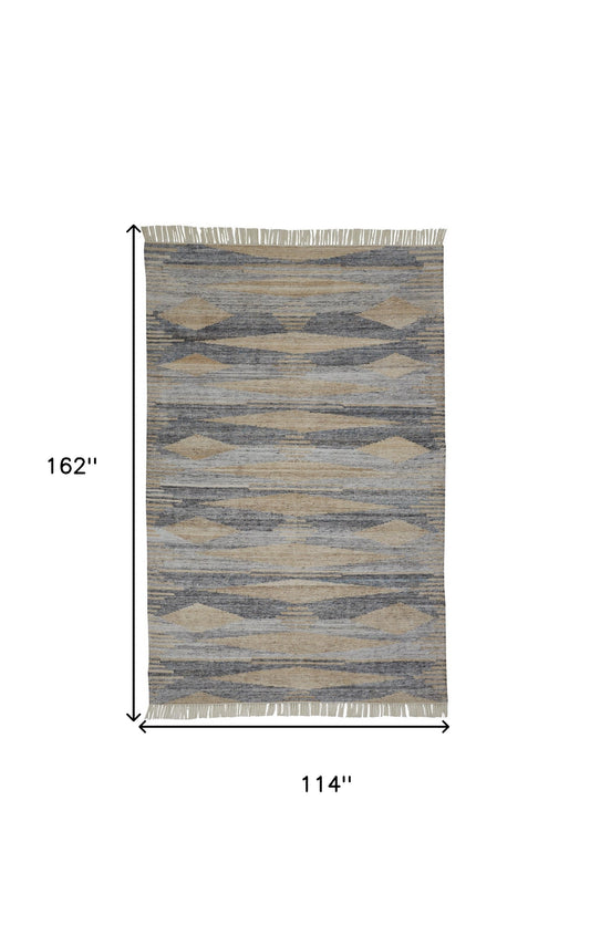 4' X 6' Gray Tan And Silver Abstract Hand Woven Stain Resistant Area Rug With Fringe