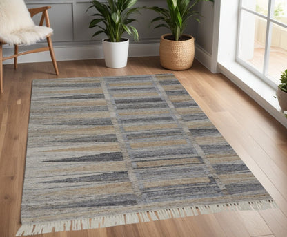5' X 8' Gray Black And Brown Geometric Hand Woven Area Rug With Fringe
