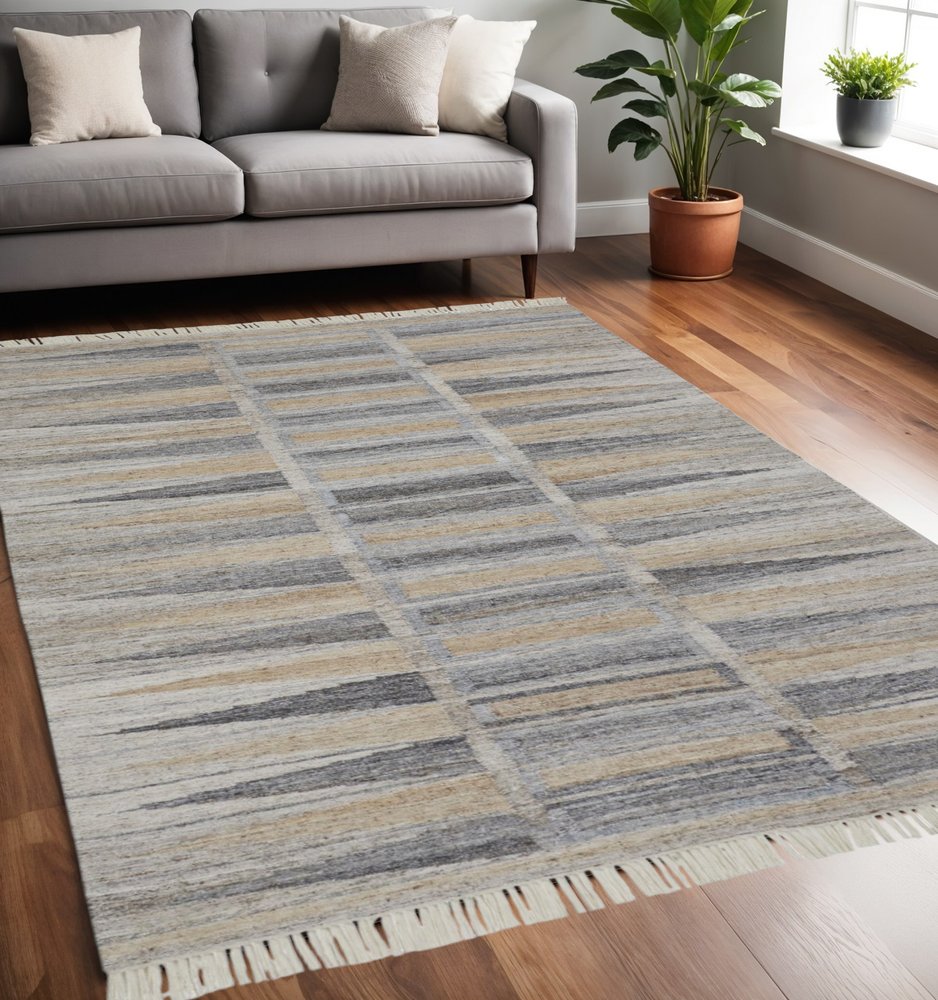 5' X 8' Gray Black And Brown Geometric Hand Woven Area Rug With Fringe