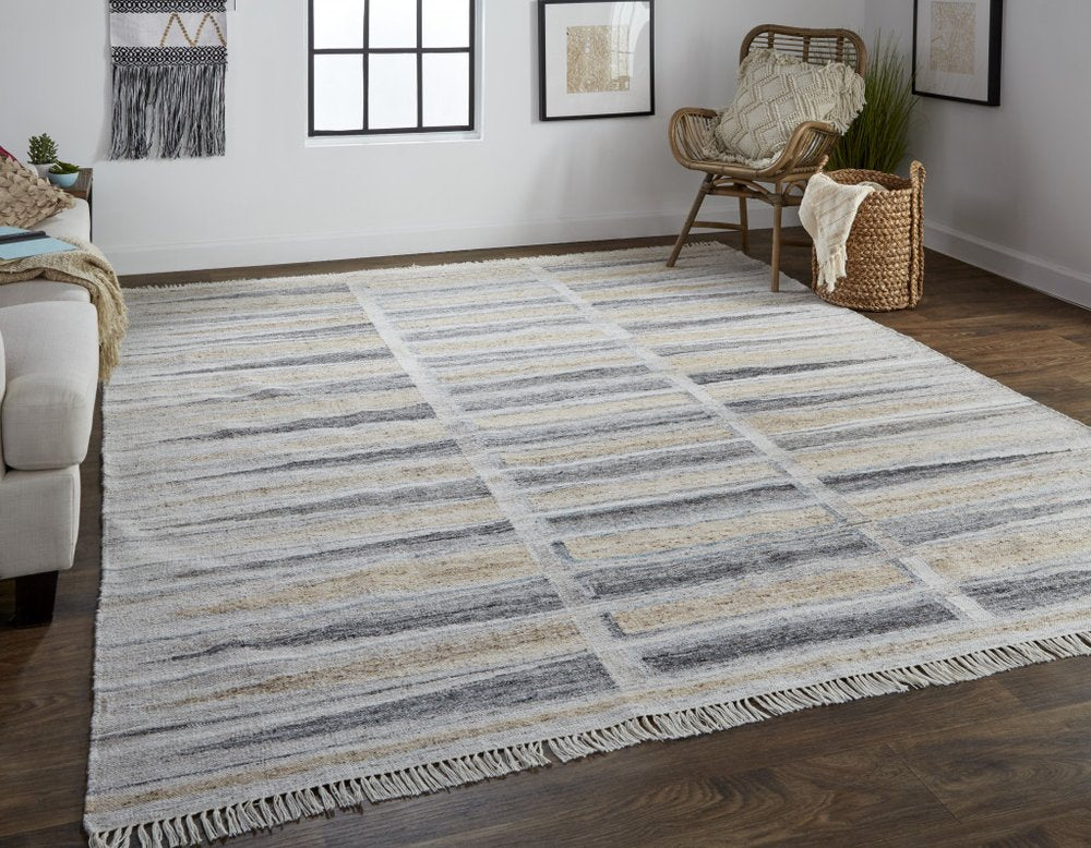 5' X 8' Gray Black And Brown Geometric Hand Woven Area Rug With Fringe