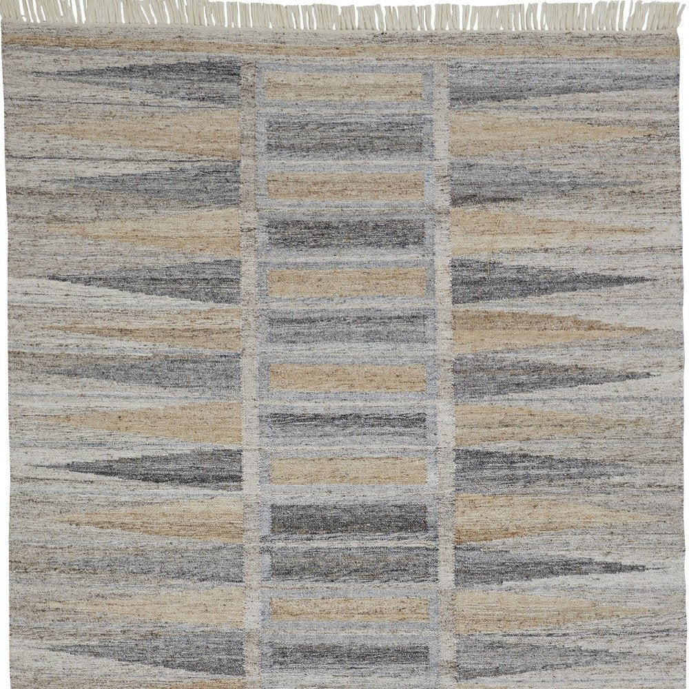 5' X 8' Gray Black And Brown Geometric Hand Woven Area Rug With Fringe