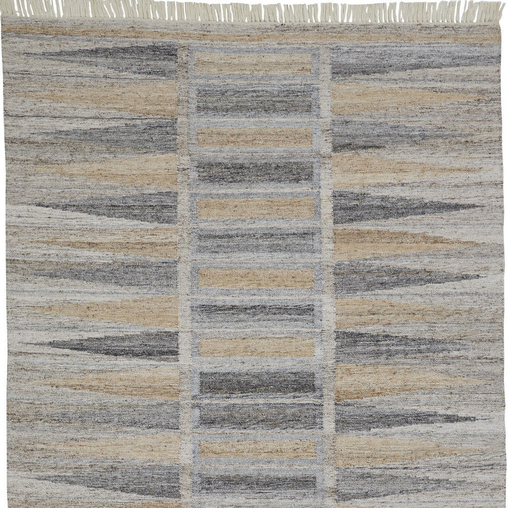 4' X 6' Tan Gray And Taupe Geometric Hand Woven Stain Resistant Area Rug With Fringe