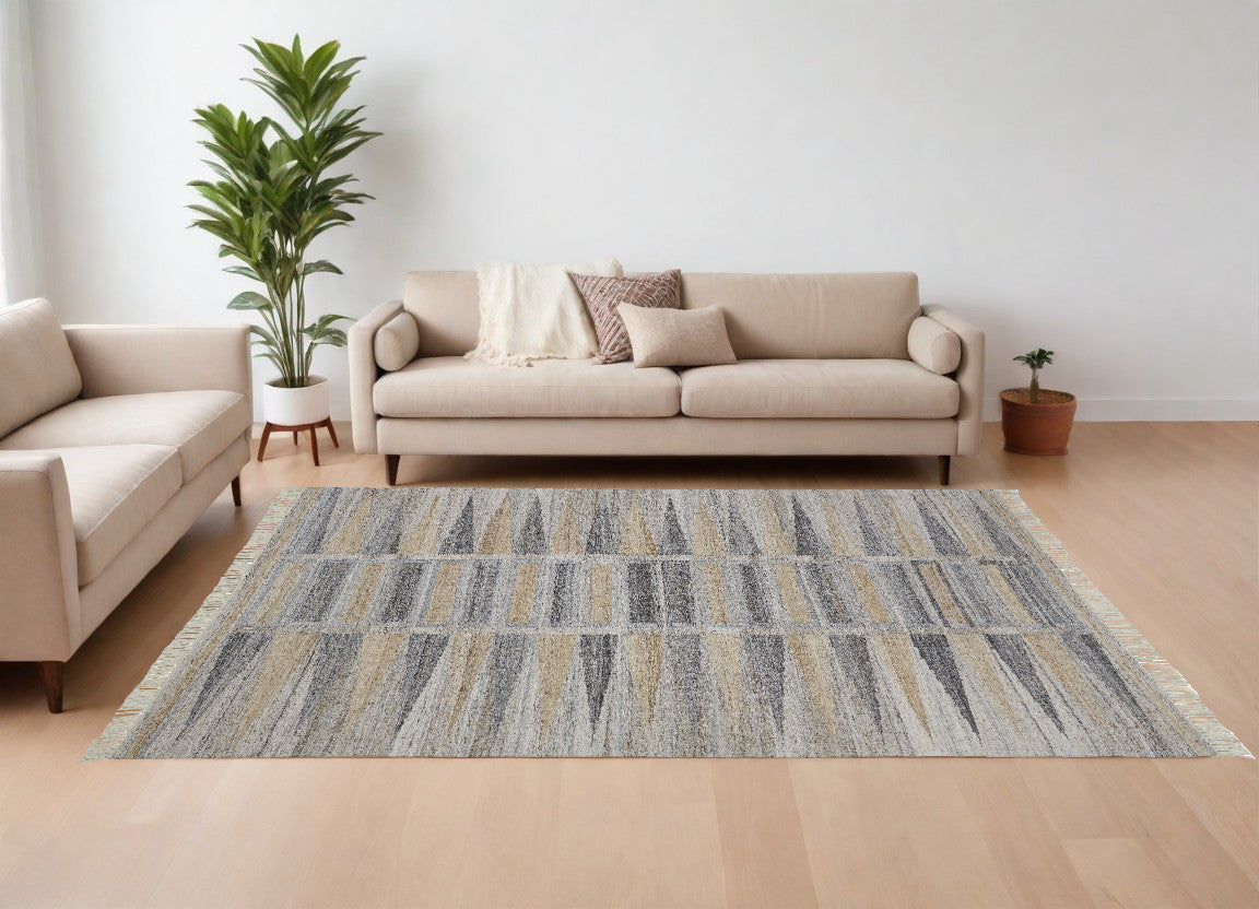 4' X 6' Tan Gray And Taupe Geometric Hand Woven Stain Resistant Area Rug With Fringe