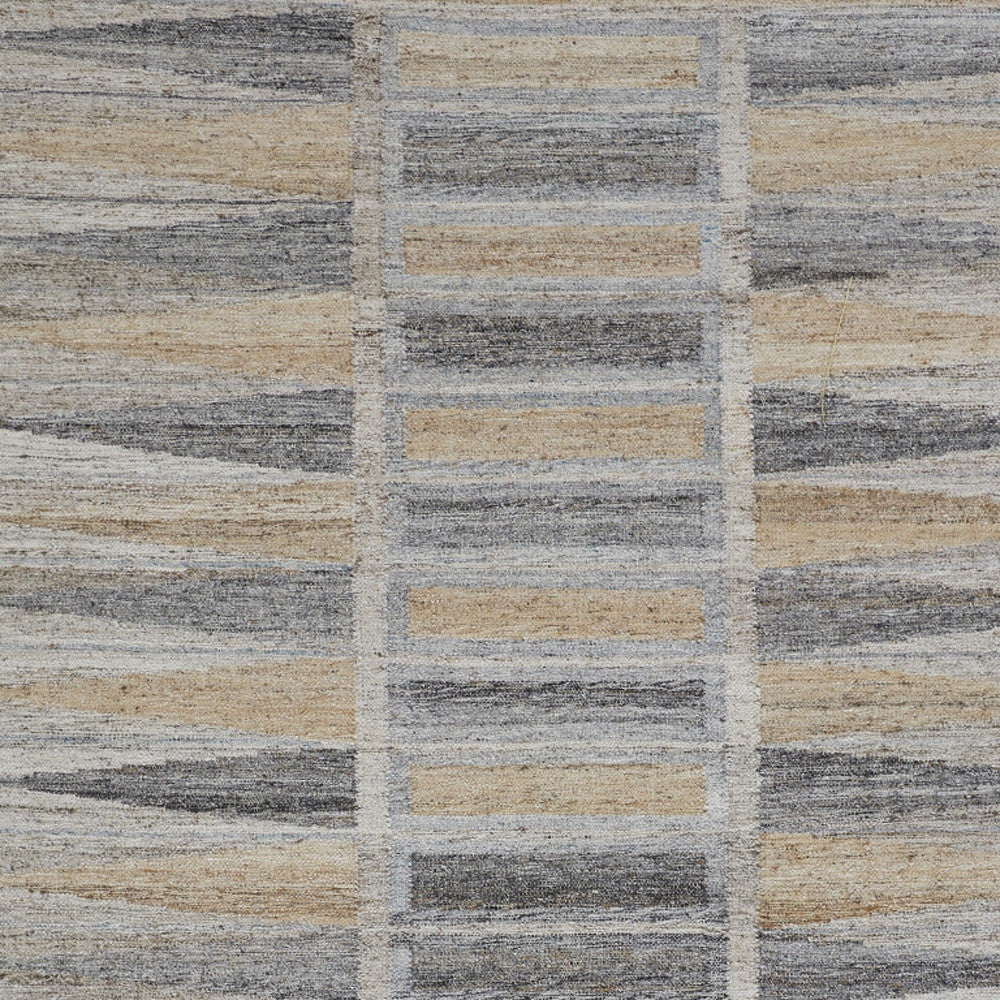 4' X 6' Tan Gray And Taupe Geometric Hand Woven Stain Resistant Area Rug With Fringe