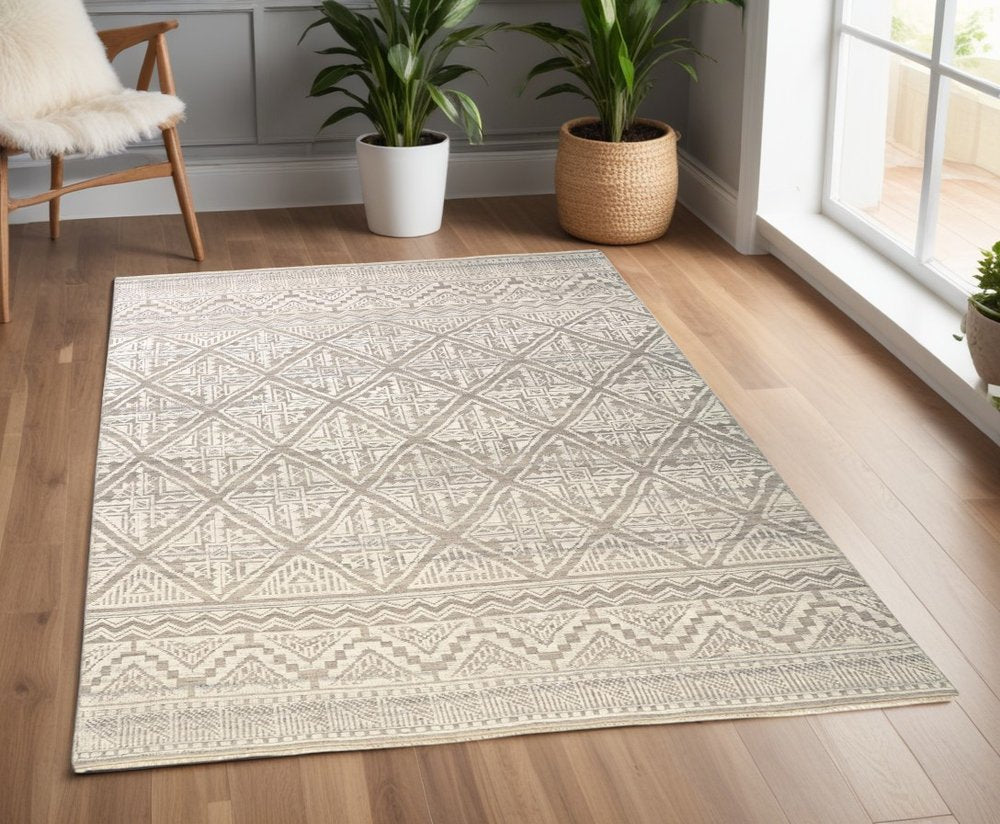 8' X 10' Ivory Tan And Gray Geometric Hand Knotted Area Rug