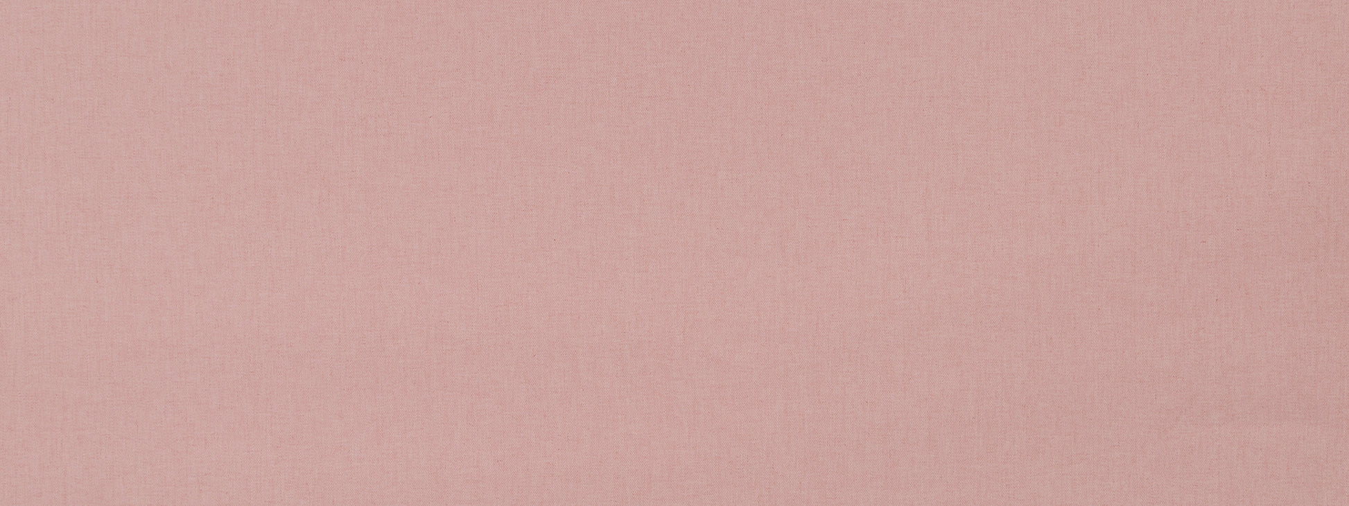 Soft pink fabric texture with subtle weave, flat swatch for apparel or home decor use.