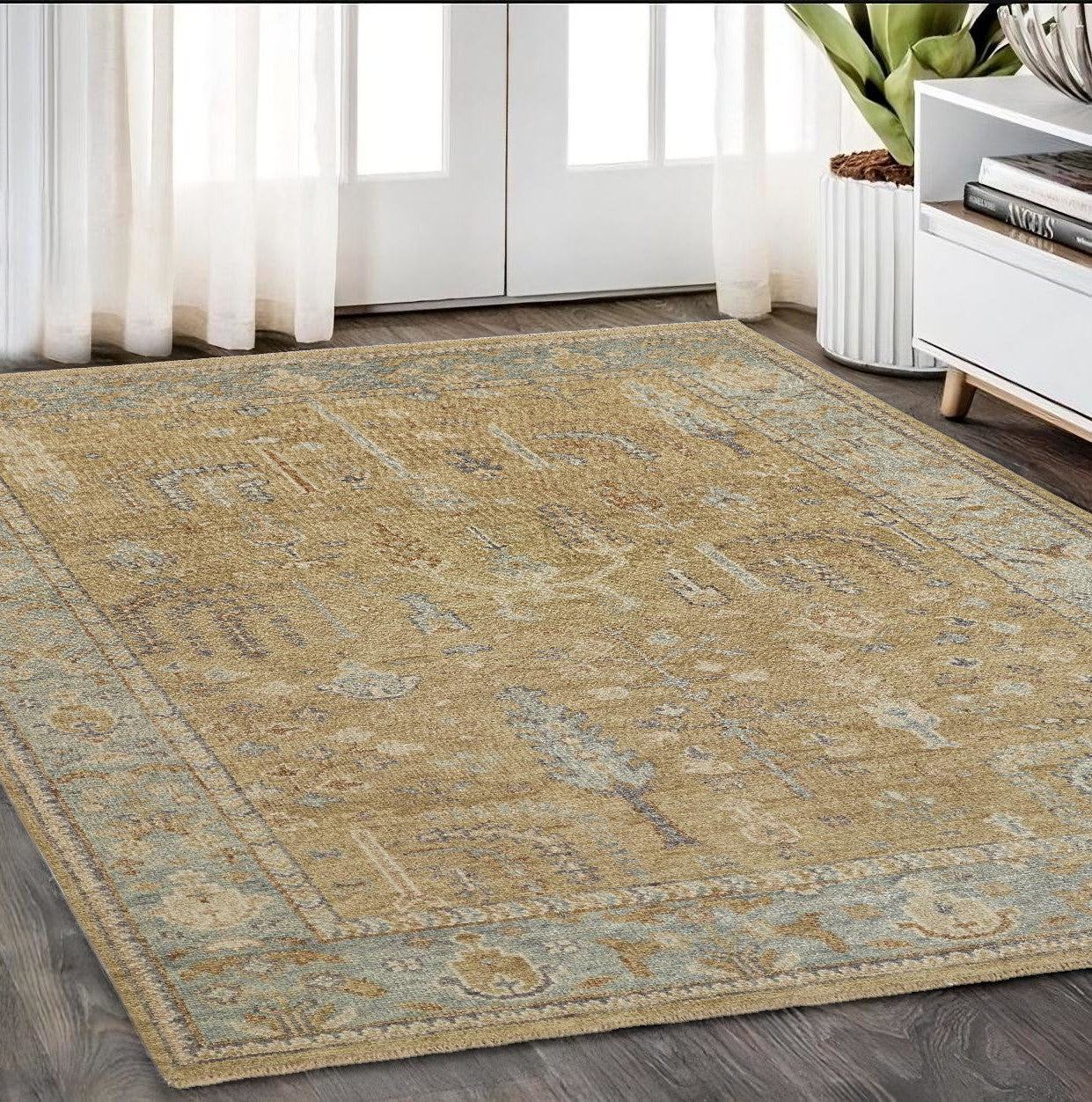 5' X 8' Gold Blue And Gray Wool Floral Hand Knotted Stain Resistant Area Rug With Fringe