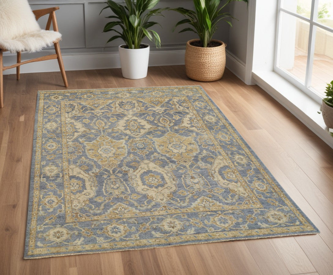 4' X 6' Blue and Gold Wool Floral Hand Knotted Area Rug With Fringe