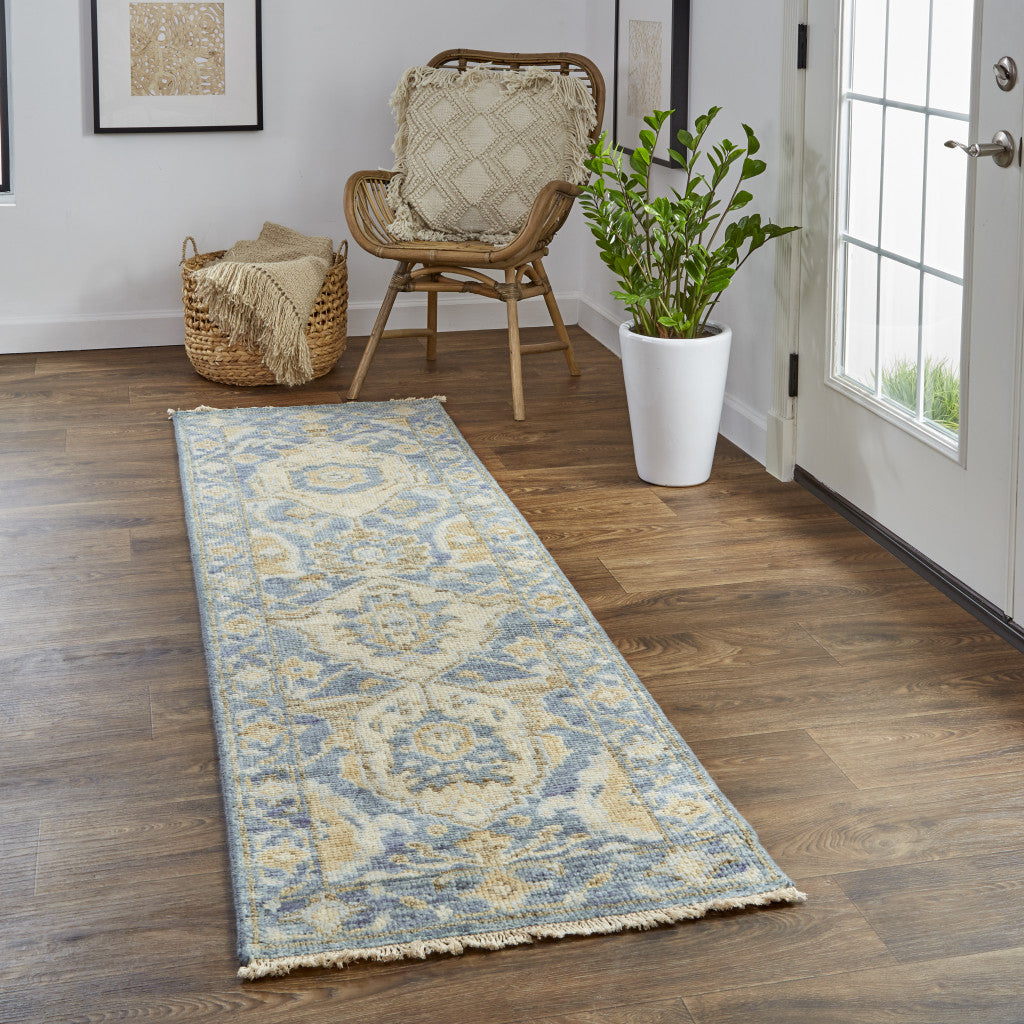 5' X 8' Blue Gold And Tan Wool Floral Hand Knotted Stain Resistant Area Rug With Fringe