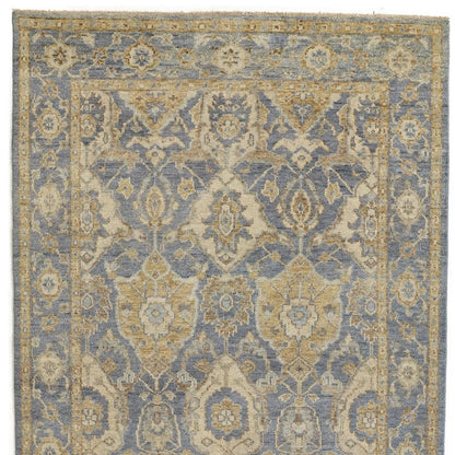 5' X 8' Blue Gold And Tan Wool Floral Hand Knotted Stain Resistant Area Rug With Fringe