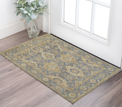 5' X 8' Blue Gold And Tan Wool Floral Hand Knotted Stain Resistant Area Rug With Fringe