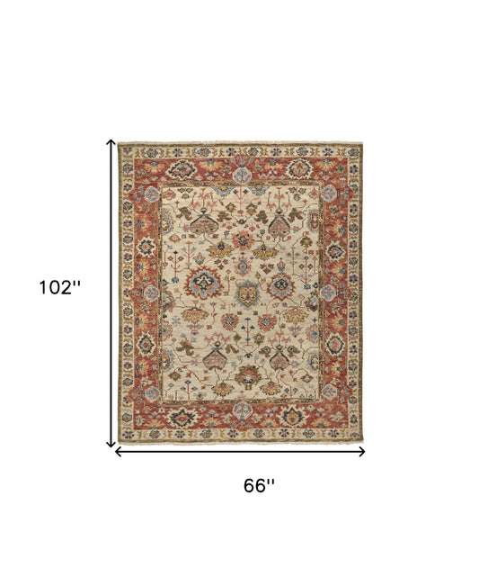 4' X 6' Ivory Red And Blue Wool Floral Hand Knotted Stain Resistant Area Rug