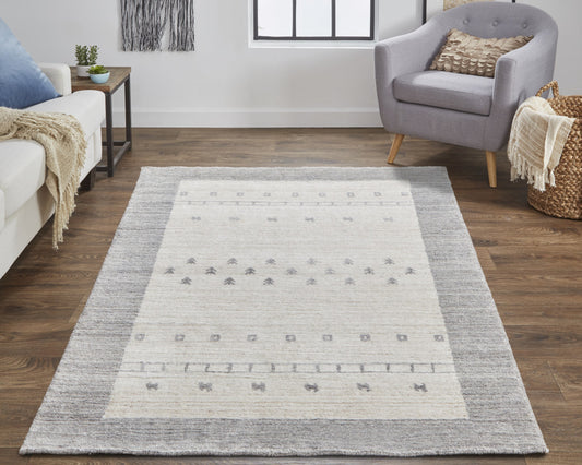 5' X 8' Ivory And Gray Wool Hand Knotted Stain Resistant Area Rug