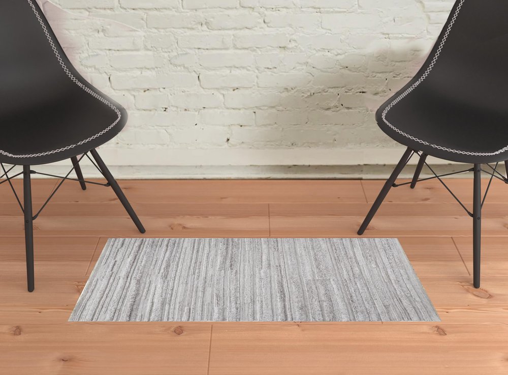 10' X 14' Ivory and Gray Striped Shag Hand Woven Area Rug