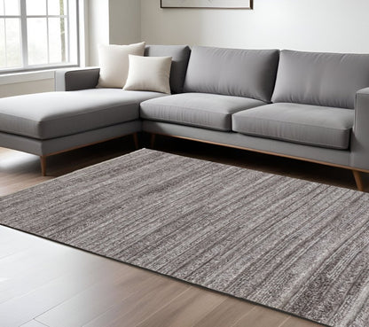 10' X 14' Ivory and Gray Striped Shag Hand Woven Area Rug