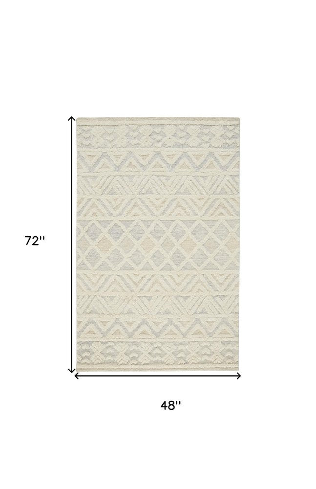 4' X 6' Ivory Blue And Tan Wool Geometric Tufted Handmade Stain Resistant Area Rug