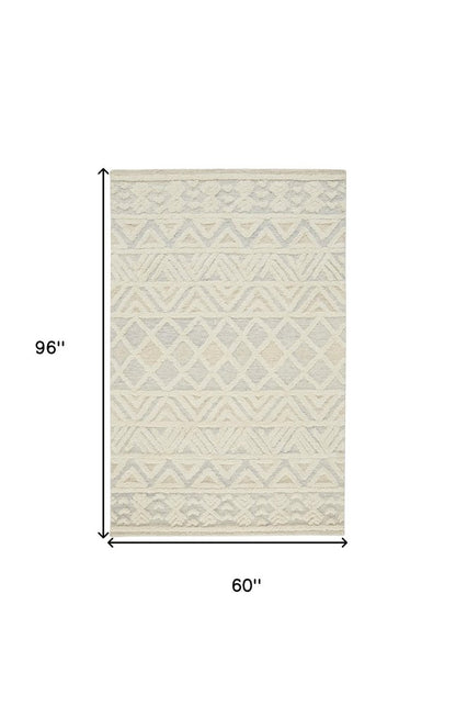4' X 6' Ivory Blue And Tan Wool Geometric Tufted Handmade Stain Resistant Area Rug