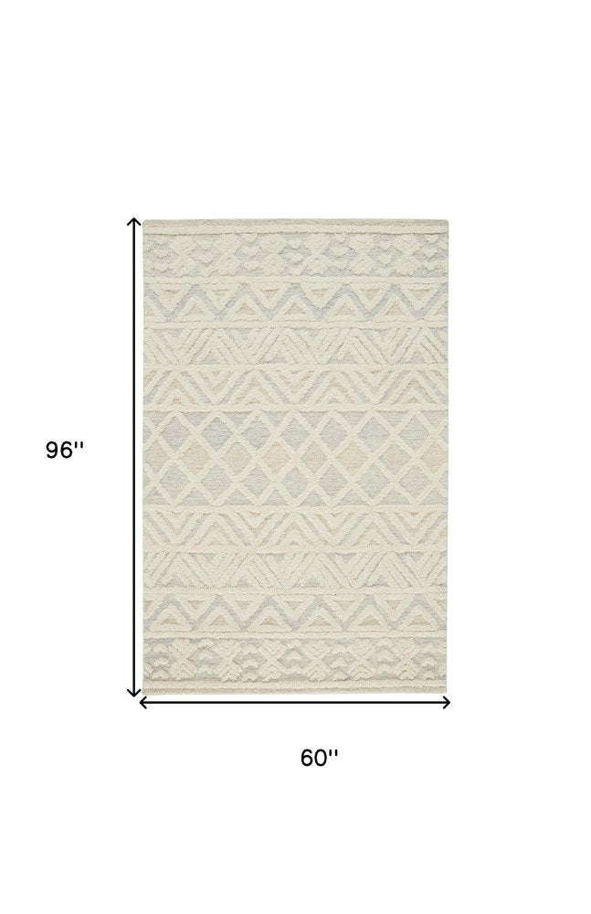 4' X 6' Ivory Blue And Tan Wool Geometric Tufted Handmade Stain Resistant Area Rug