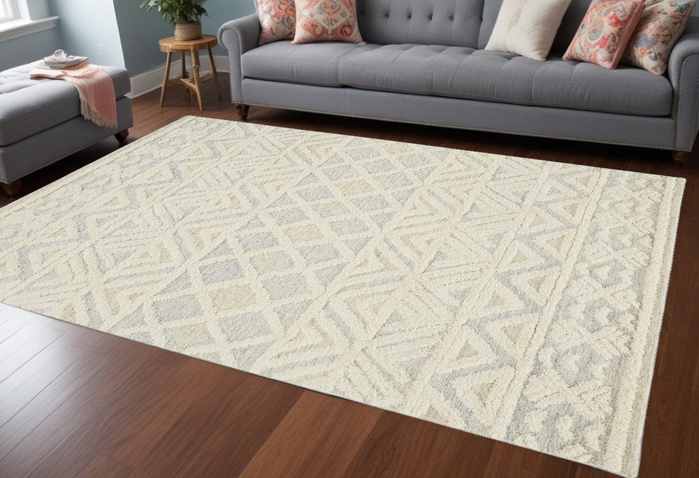 4' X 6' Ivory Blue And Tan Wool Geometric Tufted Handmade Stain Resistant Area Rug