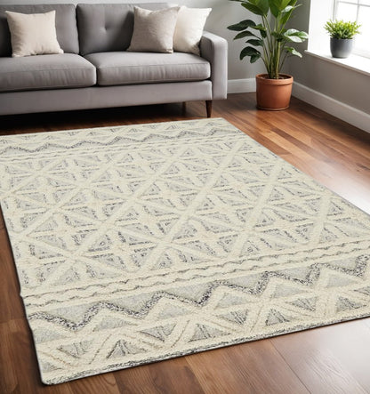 5' X 8' Ivory And Black Wool Geometric Tufted Handmade Stain Resistant Area Rug
