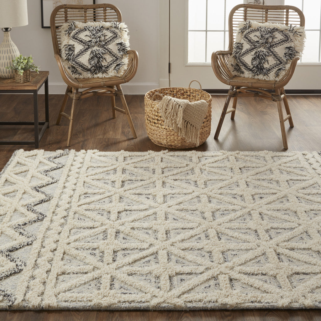 5' X 8' Ivory And Black Wool Geometric Tufted Handmade Stain Resistant Area Rug