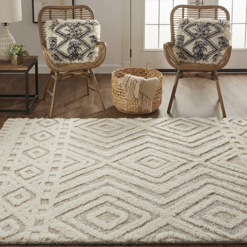 8' X 10' Ivory And Tan Wool Geometric Tufted Handmade Stain Resistant Area Rug