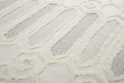 5' X 8' Ivory Taupe And Tan Wool Geometric Tufted Handmade Stain Resistant Area Rug