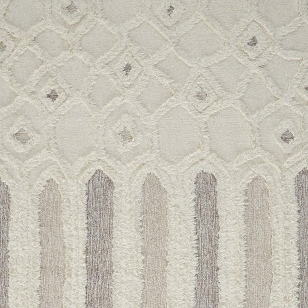 5' X 8' Ivory Taupe And Tan Wool Geometric Tufted Handmade Stain Resistant Area Rug