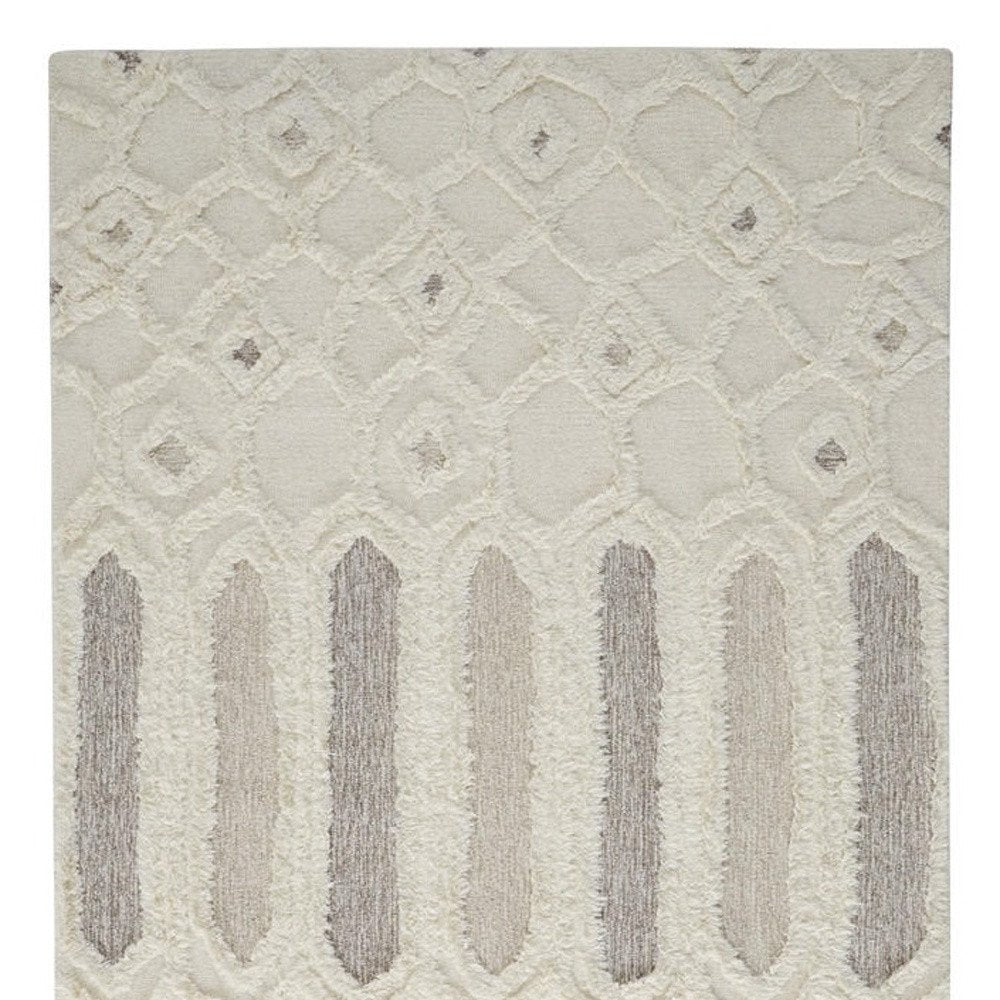 5' X 8' Ivory Taupe And Tan Wool Geometric Tufted Handmade Stain Resistant Area Rug
