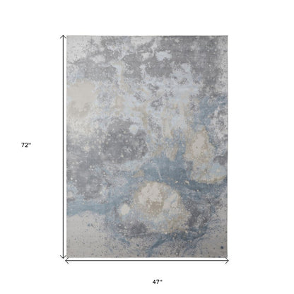 2' X 3' Ivory Blue And Gray Abstract Area Rug