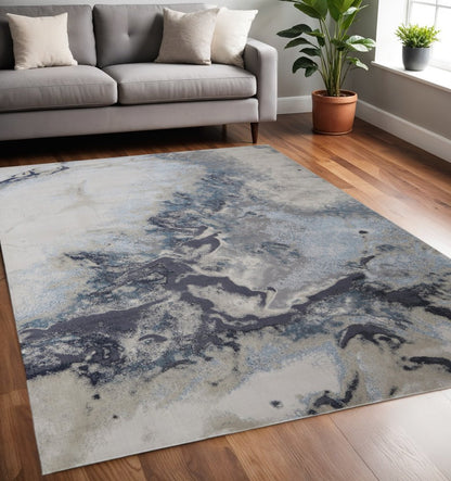 4' X 6' Ivory Black And Gray Abstract Area Rug