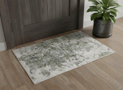 5' X 8' Green Gray And Ivory Abstract Distressed Stain Resistant Area Rug