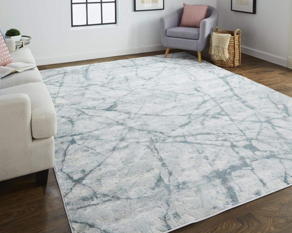 3' X 5' Blue Gray And Ivory Abstract Distressed Stain Resistant Area Rug