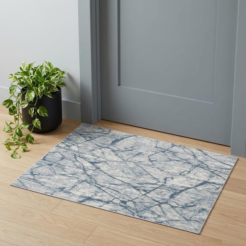 10' X 13' Blue Gray And Ivory Abstract Distressed Stain Resistant Area Rug